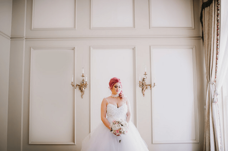 Bride Jess channels Marie Antoinette in her Lauren Elaine Monarch gown.