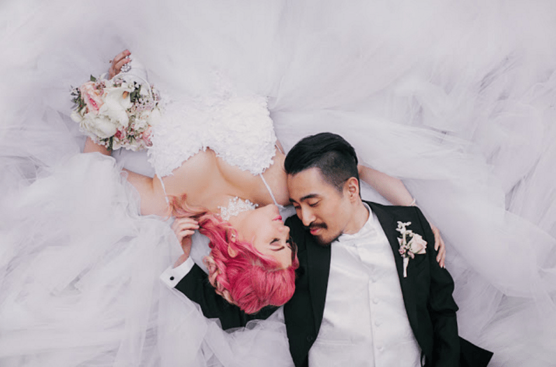 Bride Jess wears the Lauren Elaine  tulle Monarch wedding gown.