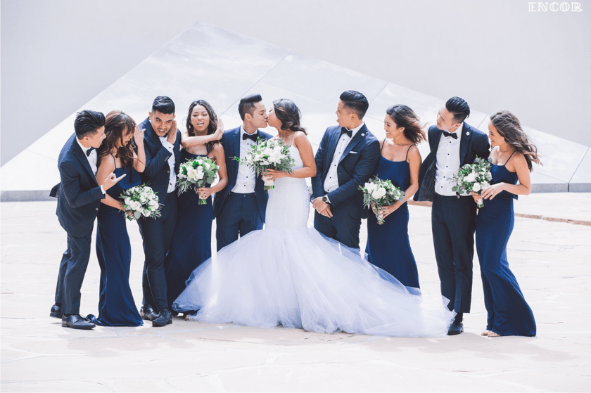 Michele poses in her backless mermaid wedding gown by Lauren Elaine