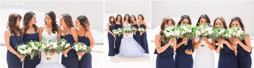 Michele poses with her bridesmaids in her custom Lauren Elaine wedding dress