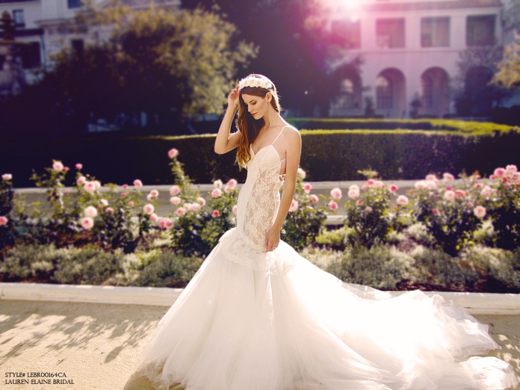 Champagne illusion mermaid wedding gown with long tulle train and sweetheart bodice