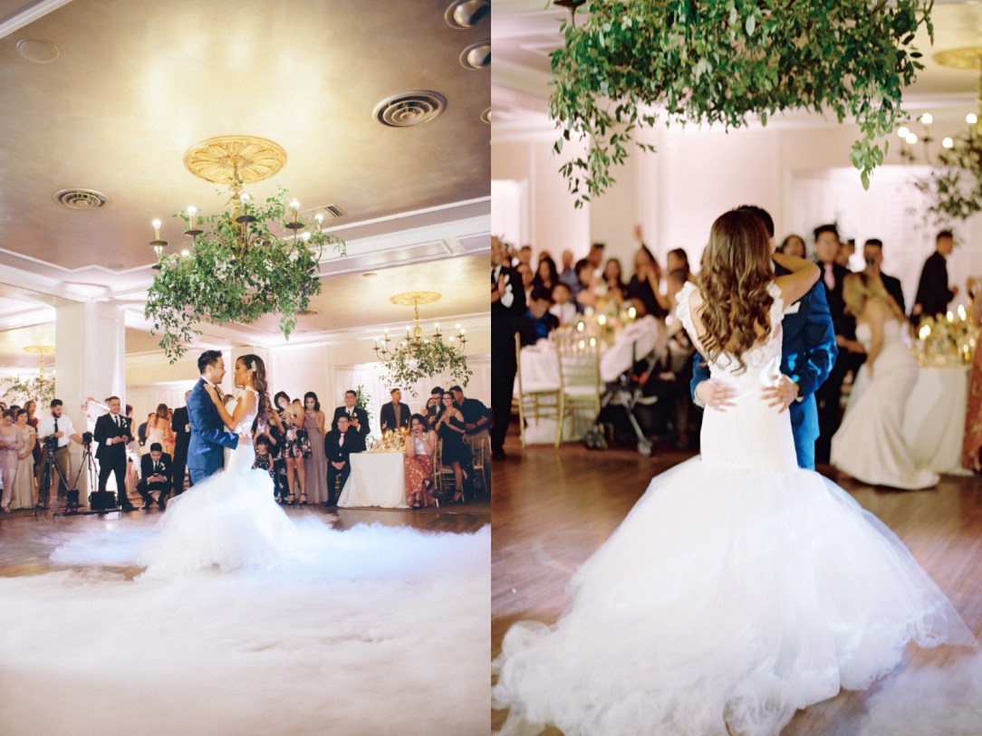 Bride Mary dances in her Lauren Elaine Oriana gown with cathedral train
