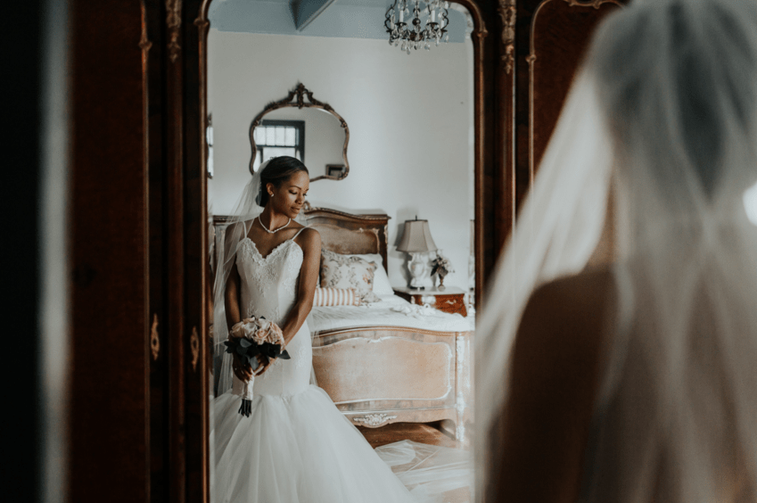 Bride portrait in mirror reflection of Harmony wearing Lauren Elaine Arabelle wedding dress
