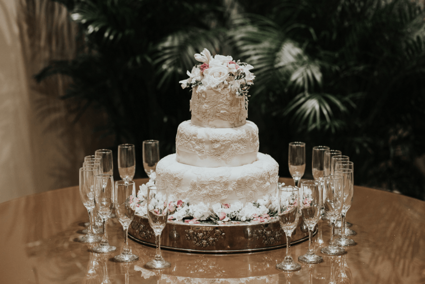 White floral wedding cake at La Pavillion in Lafayette, Louisiana