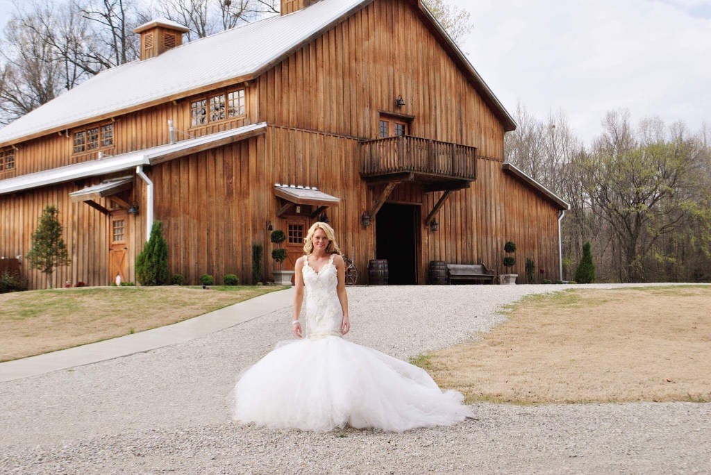 Bride Kodi wears her custom Lauren Elaine "Wisteria" mermaid wedding dress in Arkansas