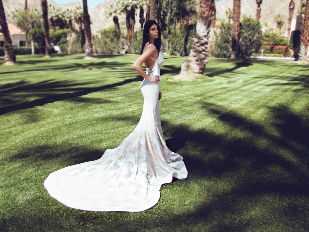 Backless mermaid form-fit wedding dress with crystal and pearl detailing for destination beach wedding by Lauren Elaine Bridal 