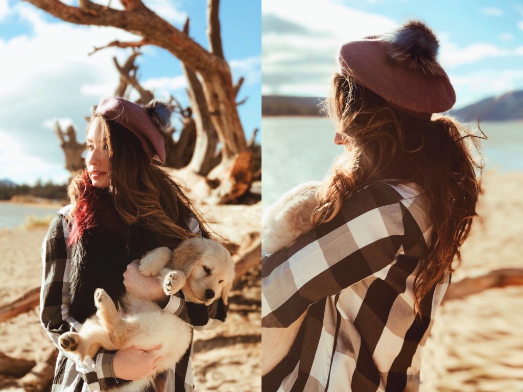 Fashion Designer Lauren Elaine plays with new puppy "Mojave" in Big Bear Lake, California.