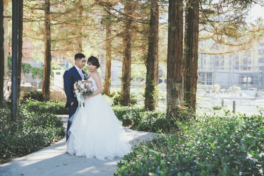 Bride Vicky wears a custom Lauren Elaine Magnolia ball gown wedding dress in Ivory 