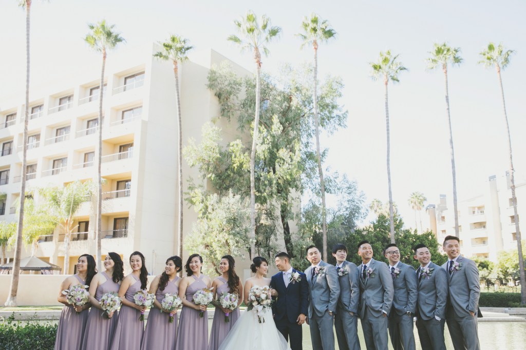 Bride Vicky wears a custom Lauren Elaine Magnolia ball gown wedding dress in Ivory 
