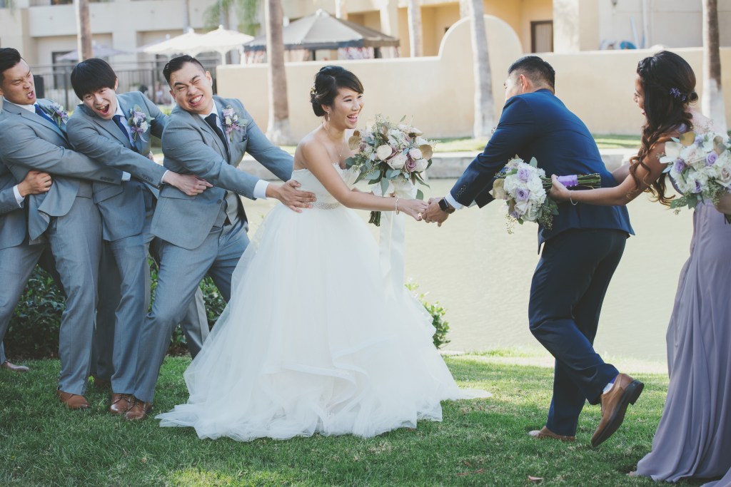 Bride Vicky wears a custom Lauren Elaine Magnolia ball gown wedding dress in Ivory 