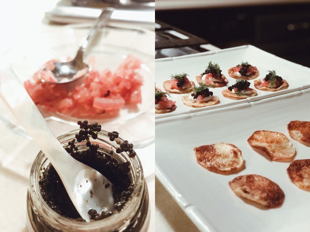 Caviar served on homemade potato crips with pickled red onions and horseradish