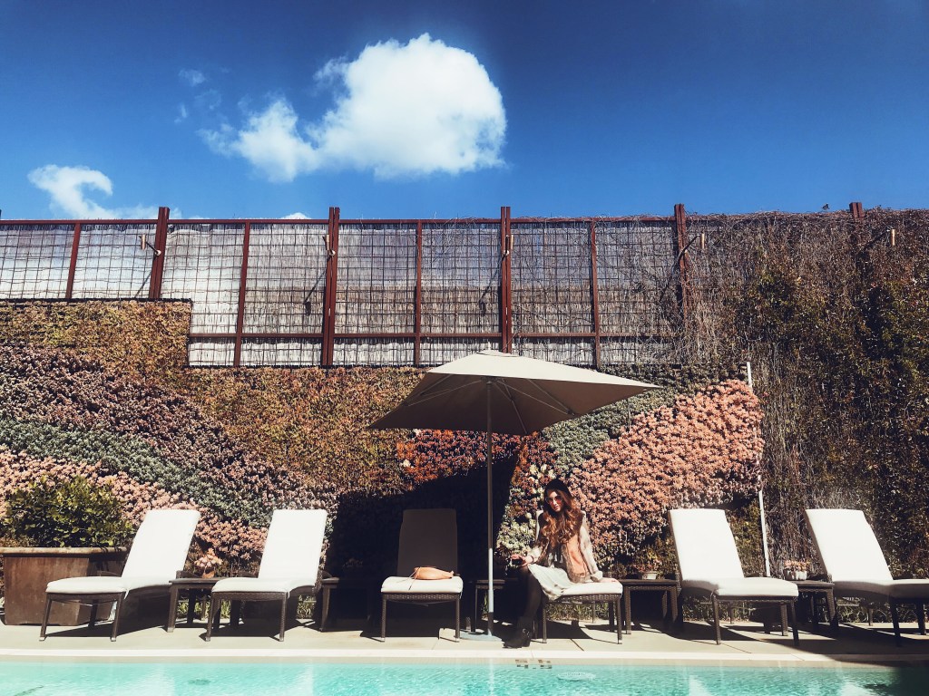 Blogger Lauren Elaine lounges poolside at the Fess Parker Wine Country Inn