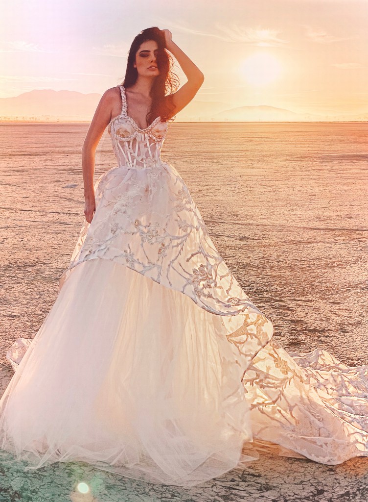 Asymmetrical high low ball gown wedding dress inspired by Sagittarius by Lauren Elaine Bridal Stardust Collection.