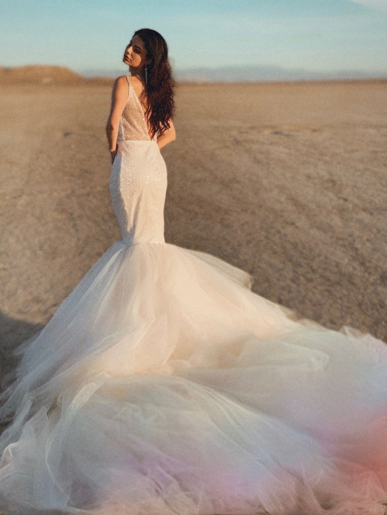 Lauren Elaine Mirage Deep V mermaid wedding dress with pastel rainbow ombre tulle skirt and detachable train.