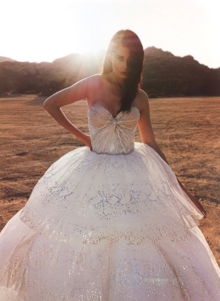 Strapless ruched organza wedding dress by Lauren Elaine Bridal.