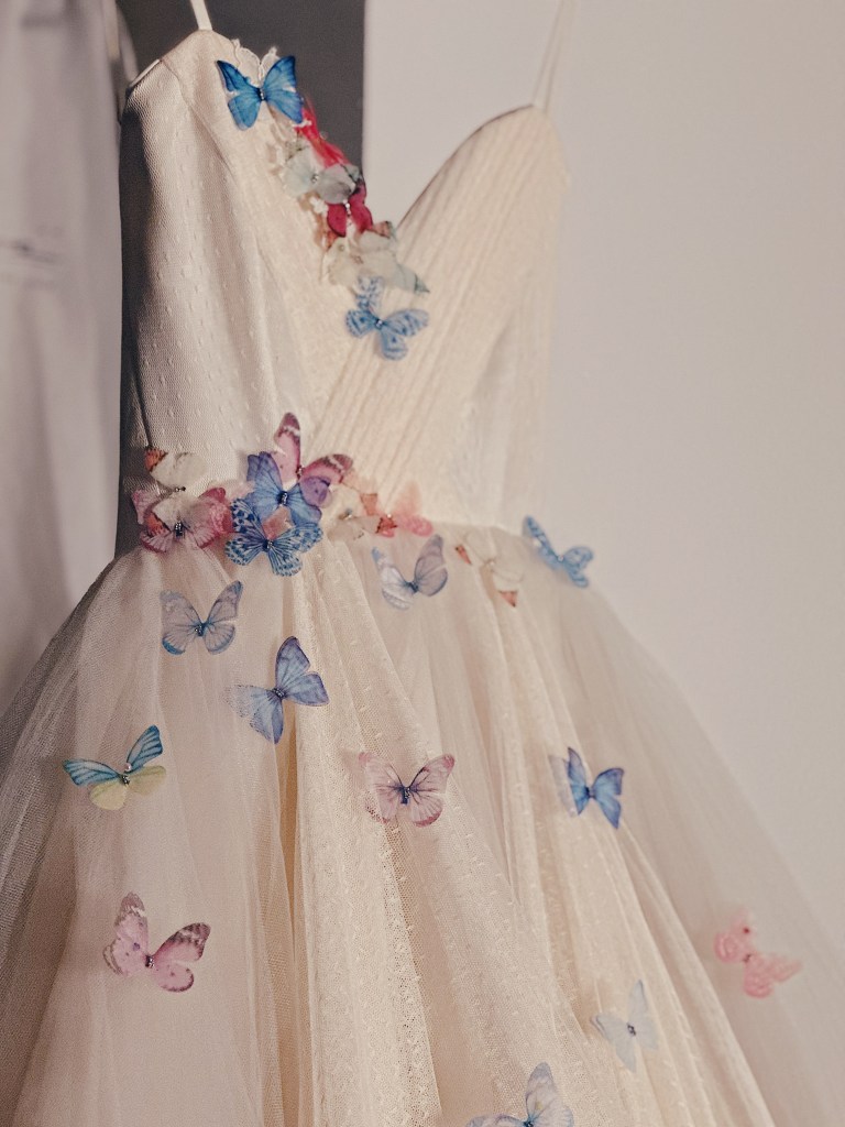 Rainbow butterfly tulle wedding dress by Lauren Elaine